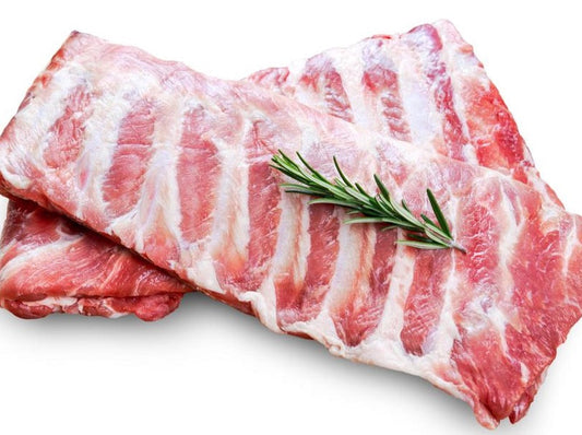 Rack of Uncooked Babyback Ribs